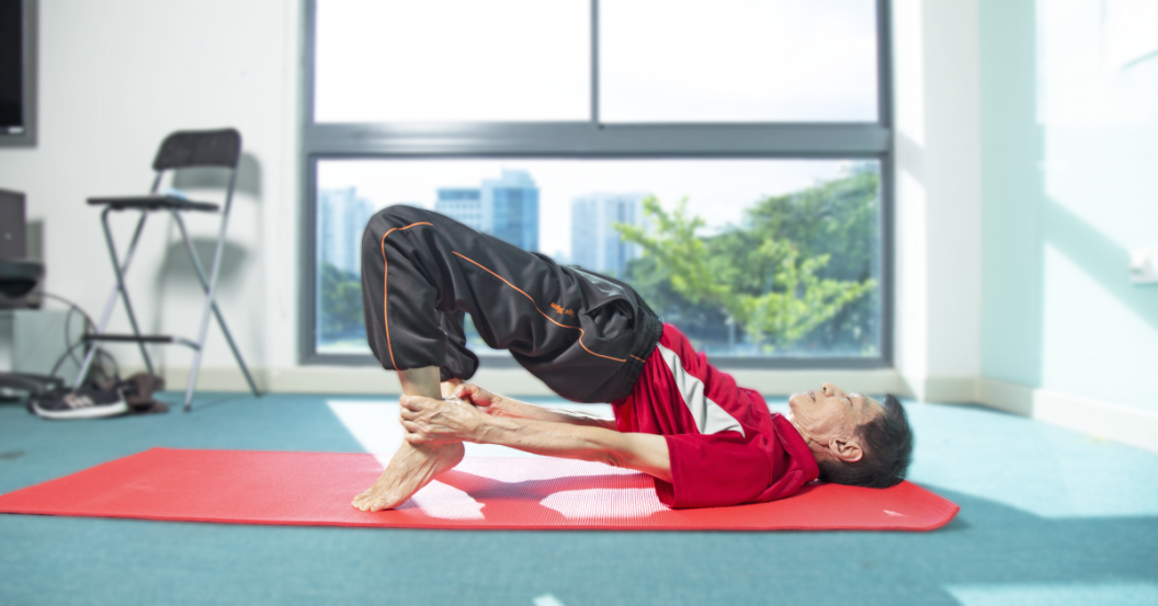 senior showcasing yoga pose senior showcasing yoga pose