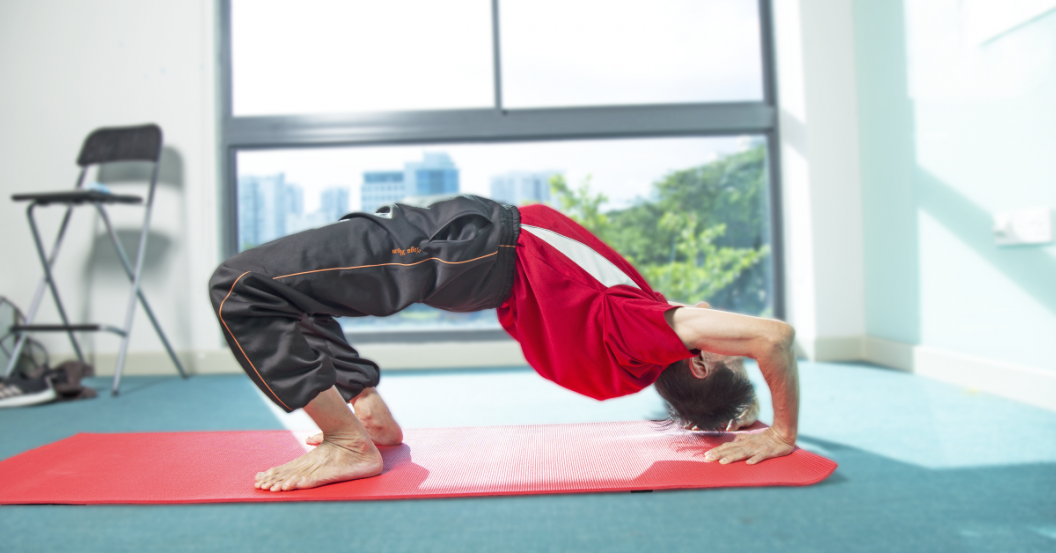 senior showcasing yoga pose senior showcasing yoga pose