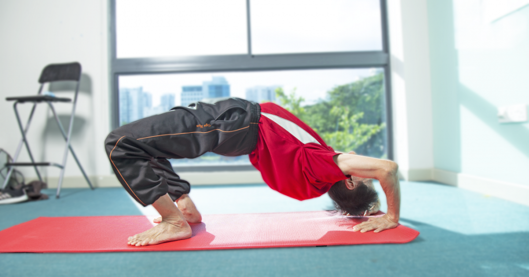 senior showcasing yoga pose