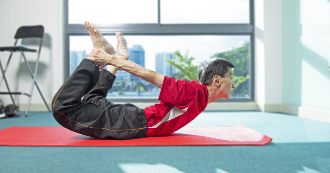 senior showcasing yoga pose senior showcasing yoga pose